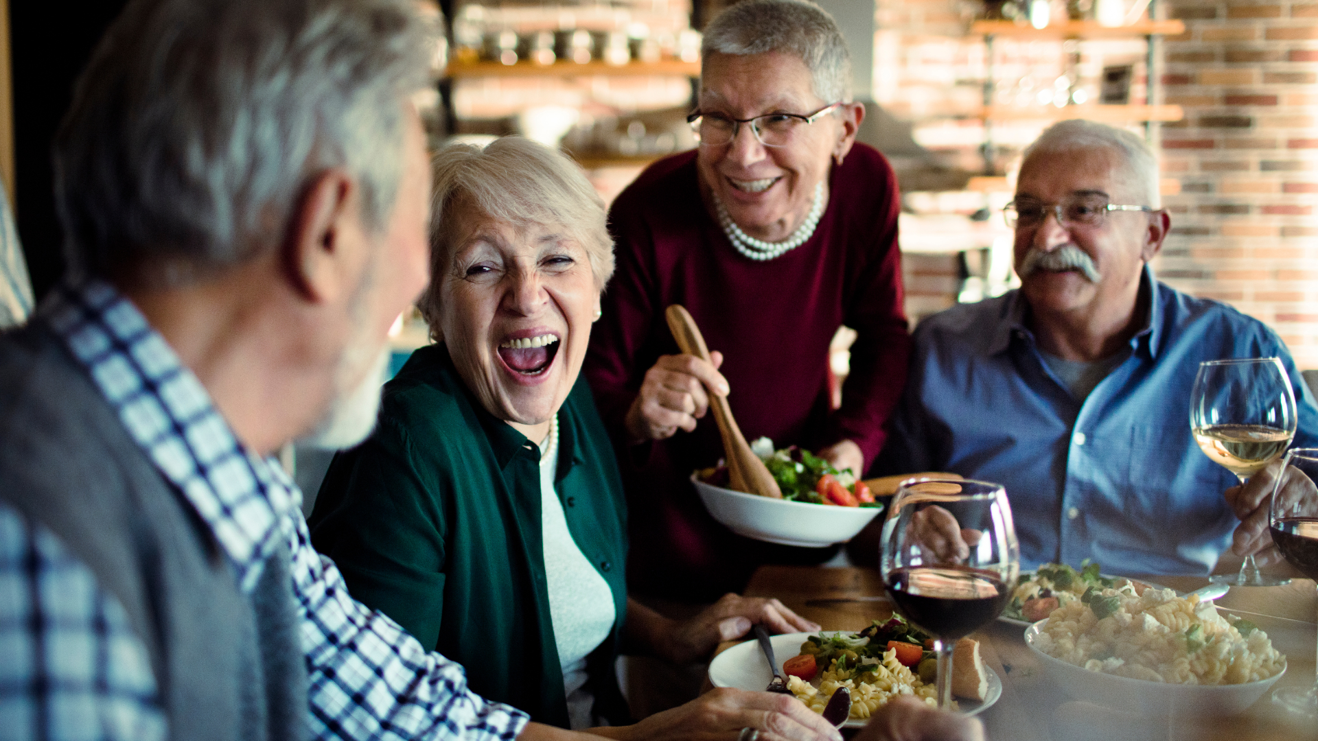 Residents enjoying a social moment in a retirement living community setting.